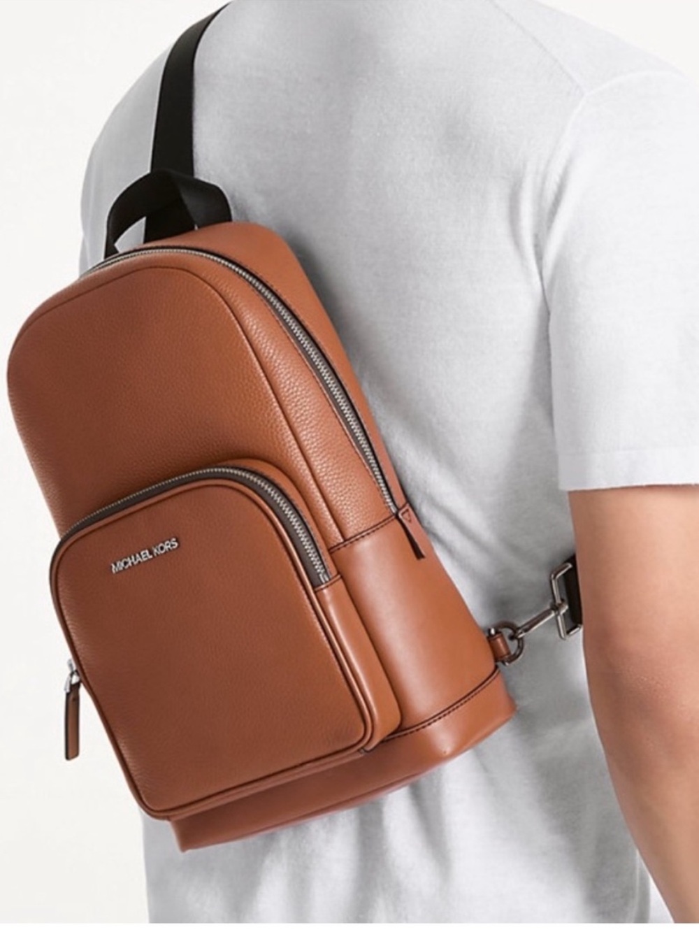 Michael Kors NWOT
Leather Sling Pack In Brown